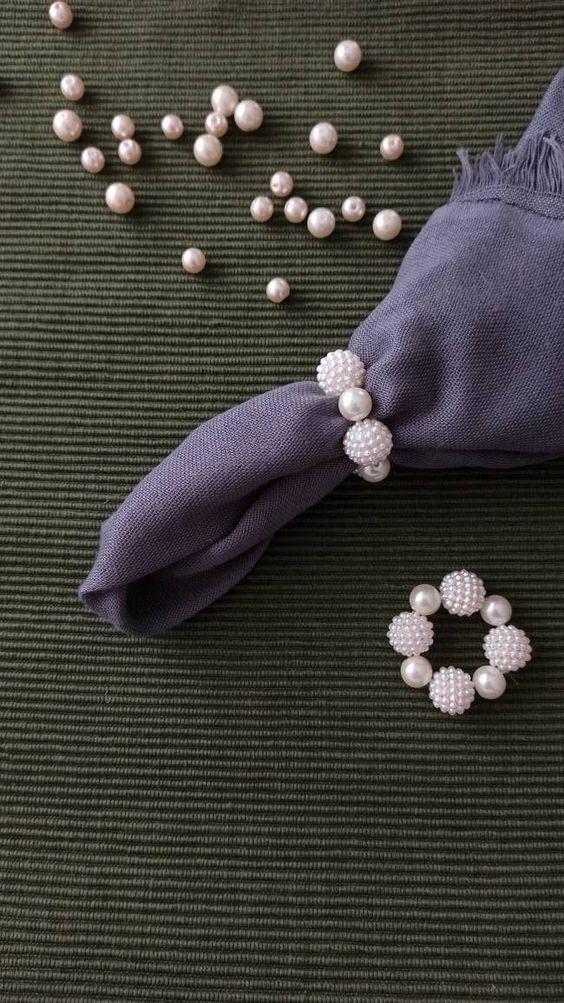 Servilleta con anillo de perlas
